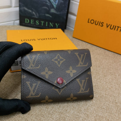 Monogram Victorine Wallet Fuchsia