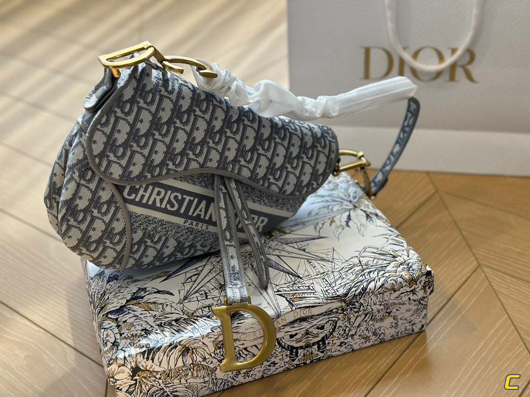 Oblique Embroidery Saddle Bag