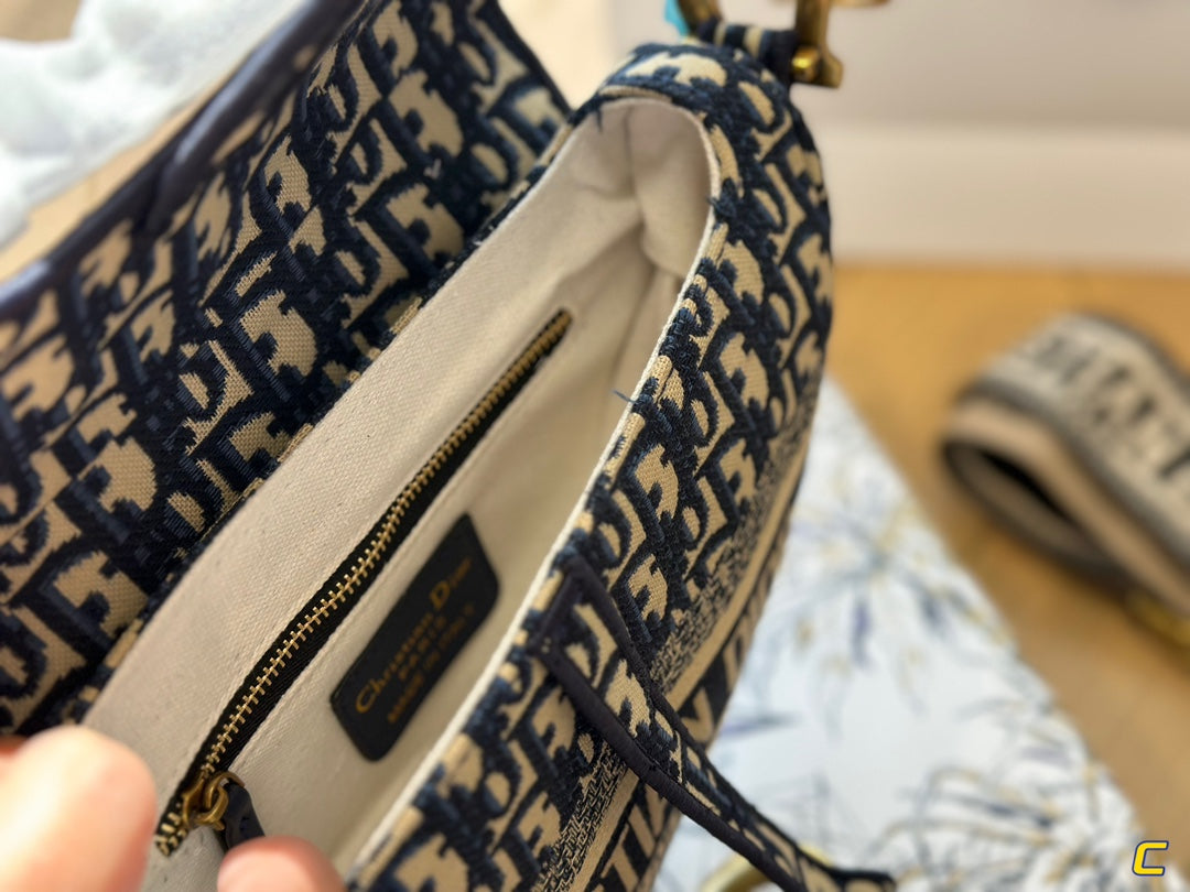 Oblique Embroidery Saddle Bag