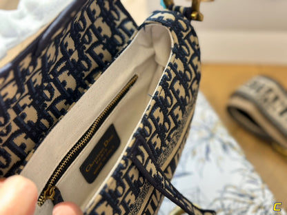 Oblique Embroidery Saddle Bag