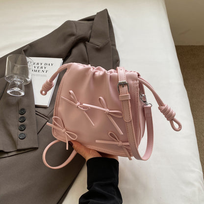 Bow decor Beige saddle bag
