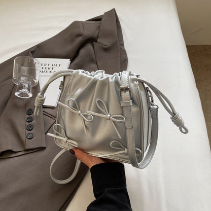 Bow decor Beige saddle bag