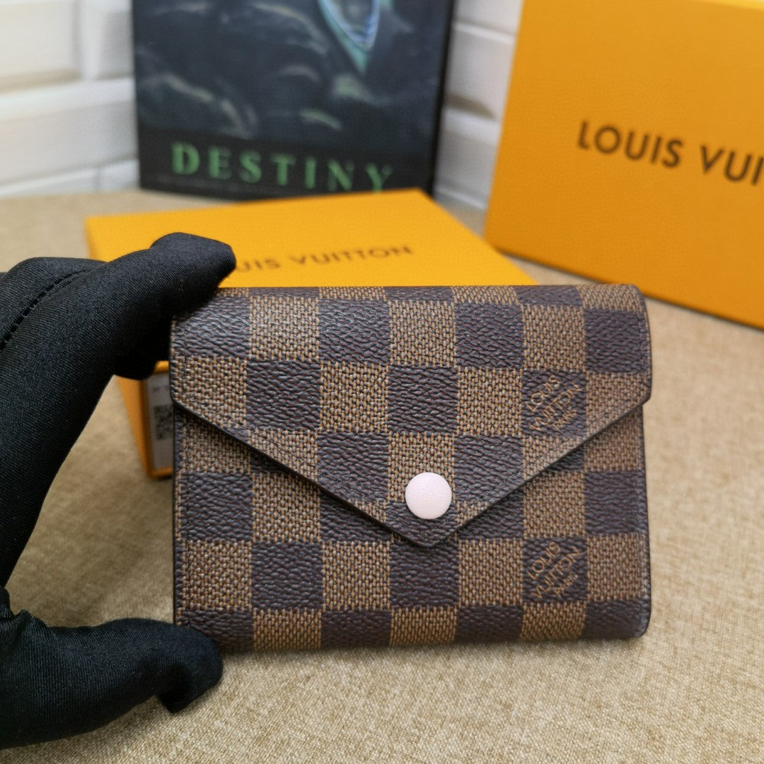Monogram Victorine Wallet Fuchsia