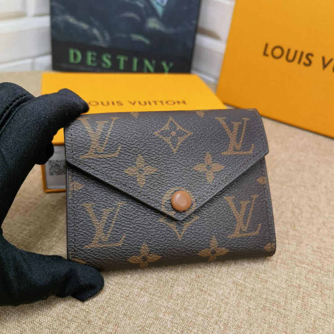 Monogram Victorine Wallet Fuchsia