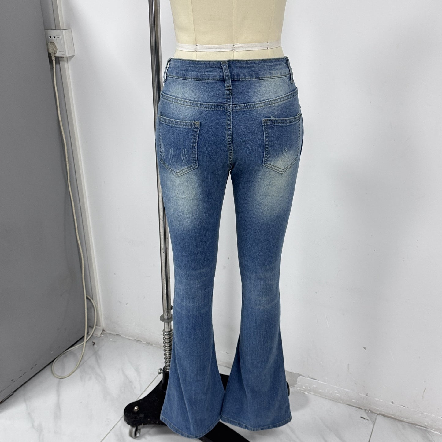Risen High Rise Medium Wash Flare Jeans