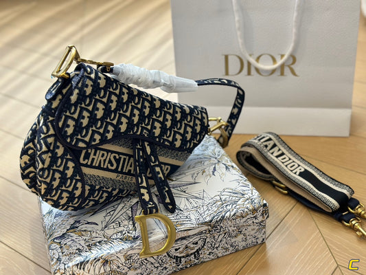Oblique Embroidery Saddle Bag