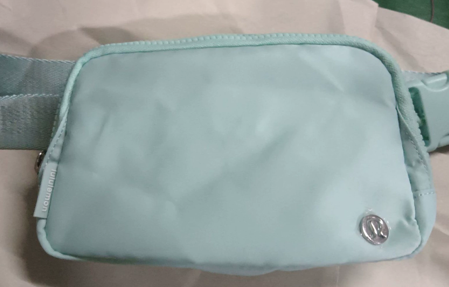 Lulu belt bag with metal logo